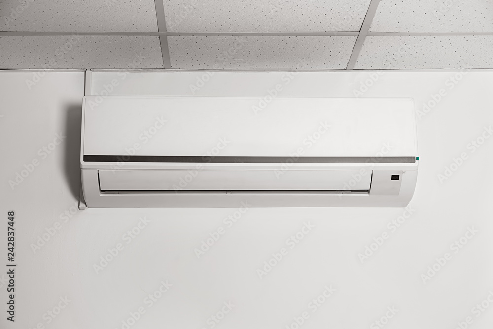 Modern air conditioner on wall Modern air conditioner on wall
