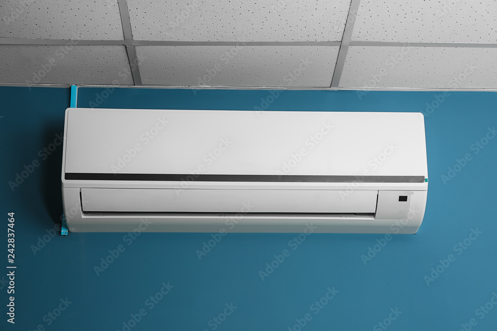 Modern air conditioner on wall Modern air conditioner on wall