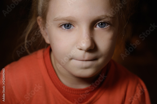 Close-up portrait of adorable little girl. Selective focus with shallow depth of field.