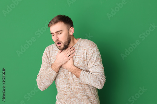 Young man having asthma att...