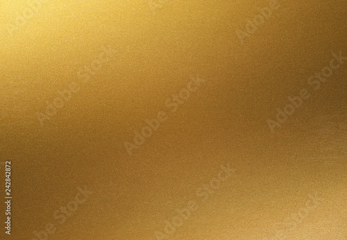 golden shiny gradient background. golden paper with metallic effect.