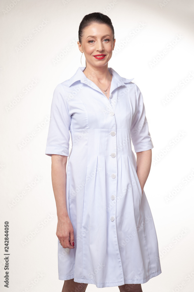 Portrait of young doctor with stethoscope on white background Portrait of young doctor with stethoscope on white background