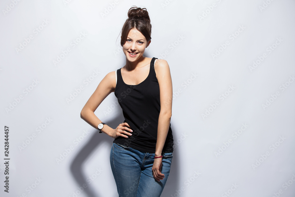 people, style and fashion concept - happy young woman or teen girl in casual clothes having fun. people, style and fashion concept - happy young woman or teen girl in casual clothes having fun.