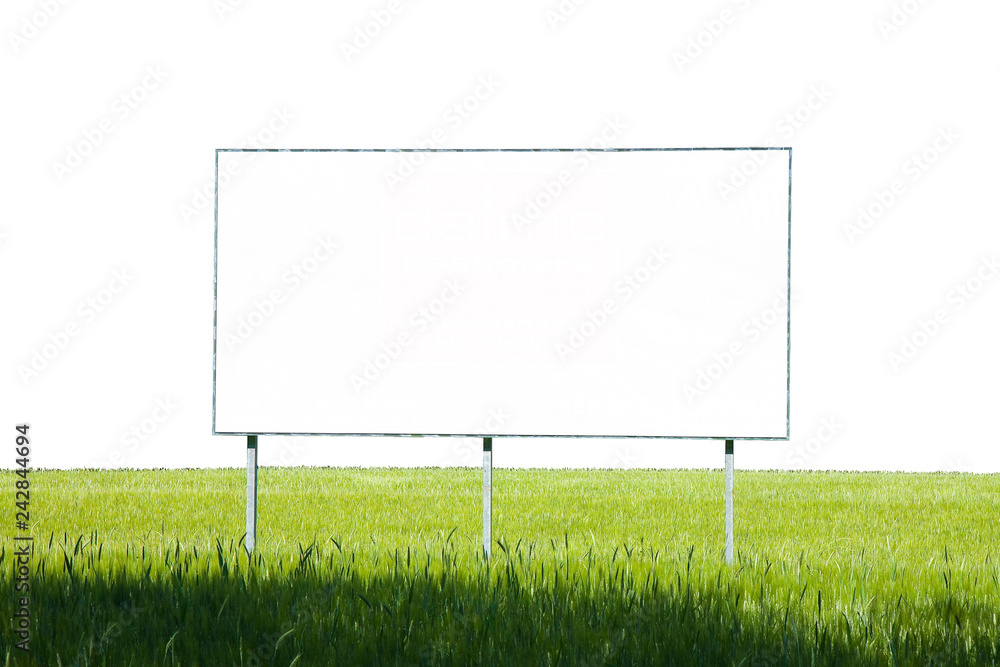 A blank advertising billboard immersed in a wheat field A blank advertising billboard immersed in a wheat field