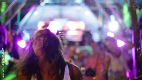 Beautiful girl is dancing in a night club. Disco. 1920x1080