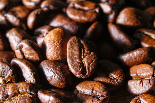 Extreme macro photography of fresh roasted coffee beans © Milan