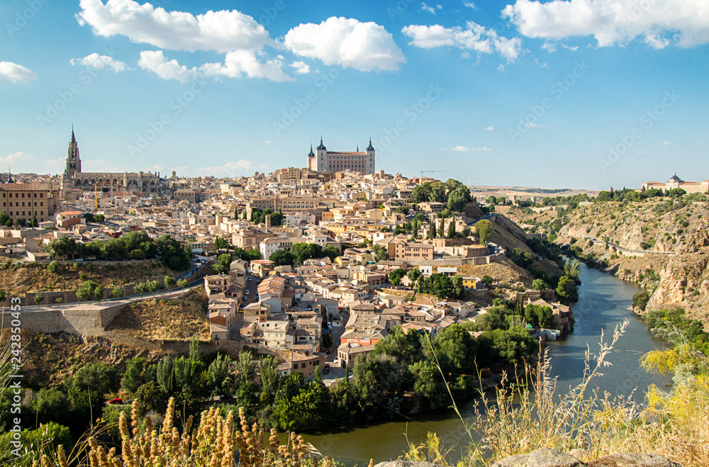 Toledo, Castilla-La Mancha, Spain. Old medieval town city skyline. Cityscape at the Alcazar and Cathedral.