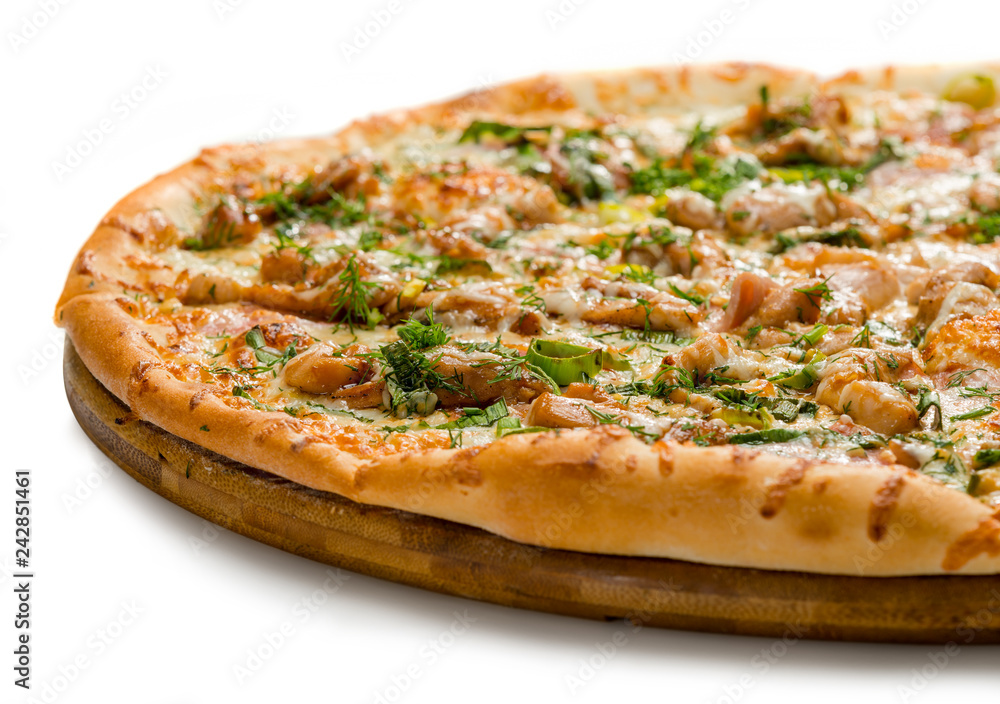 Pizza close-up, on a white background, shallow depth of field Pizza close-up, on a white background, shallow depth of field