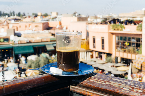 Arabian coffee with spices in Marrakesh medina. Cardamom Ramadan coffee in the oriental market