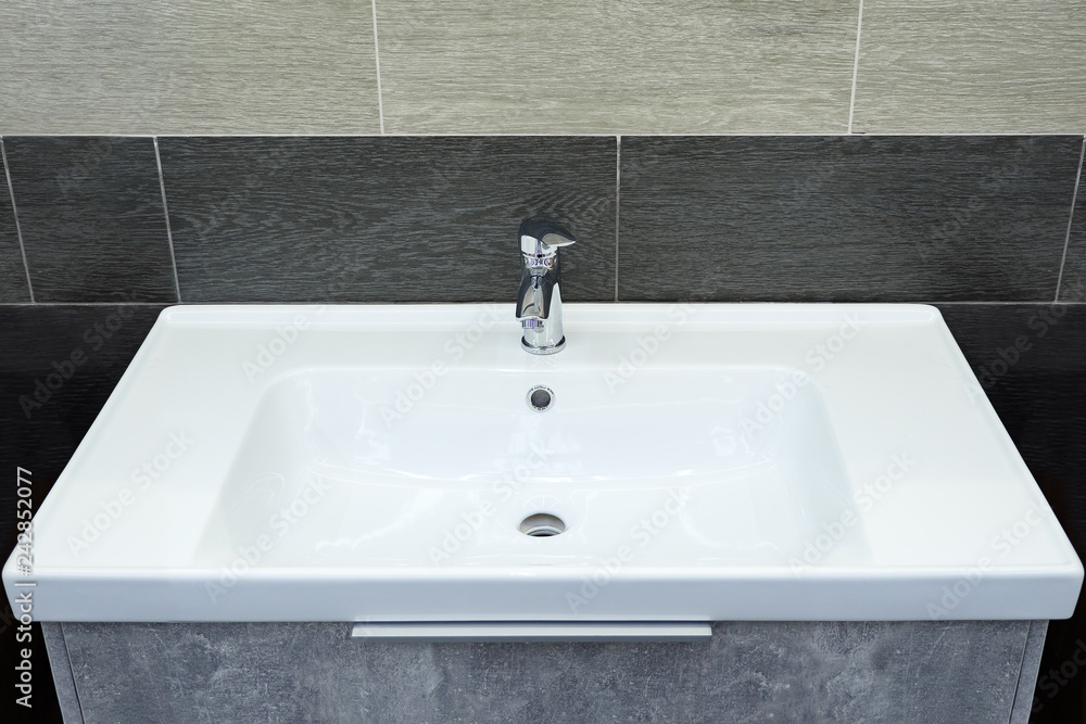 Fototapeta premium Bathroom interior with sink and faucet
