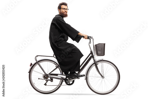 Priest riding a bicycle