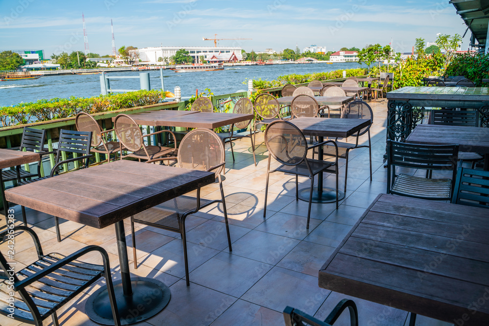 Outdoor restaurant with temple of dawn view point riverside