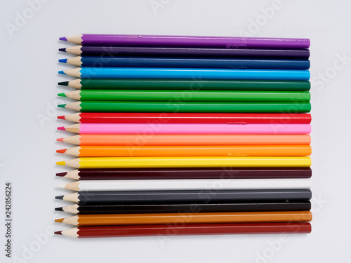 colored pencils sharpened on a white background.