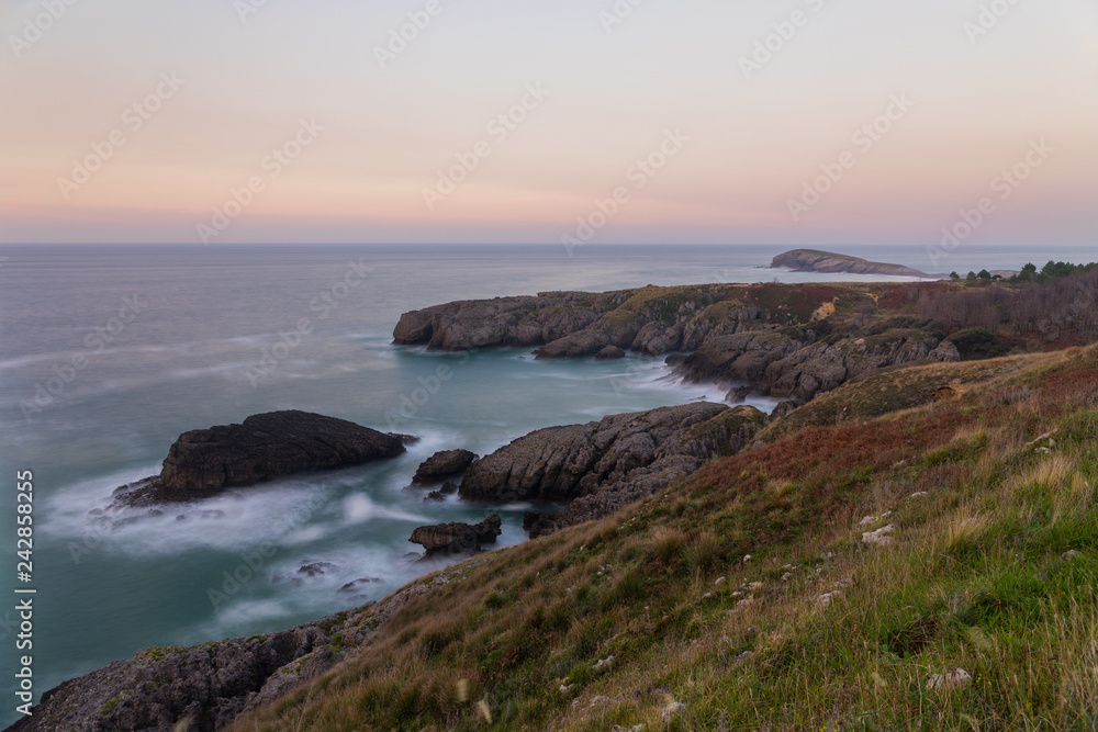 Brave coast from Cantabria next to the towns of Sonabia, Oriñon and Islares, at Spain.