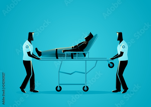 Paramedic team moving injured man on a stretcher