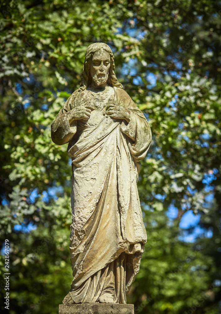 Antique statue of suffering of Jesus Christ. Religion, faith resurrection concept.