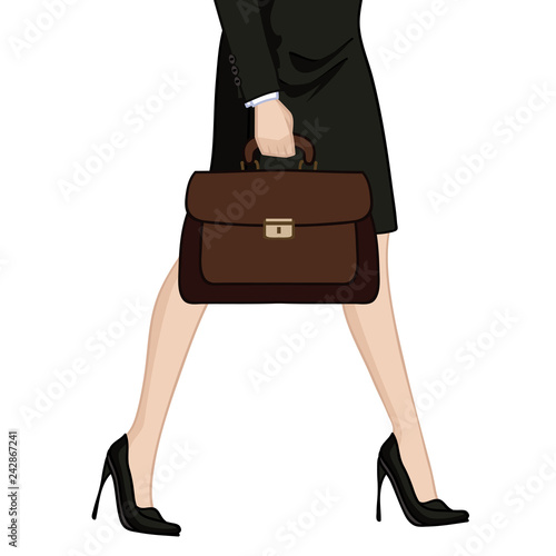Businesswoman in high heels with briefcase