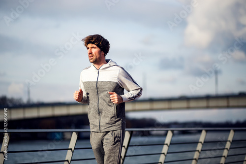 Middle aged man jogging © Novak