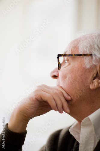 Portrait of thoughtful senior man photo