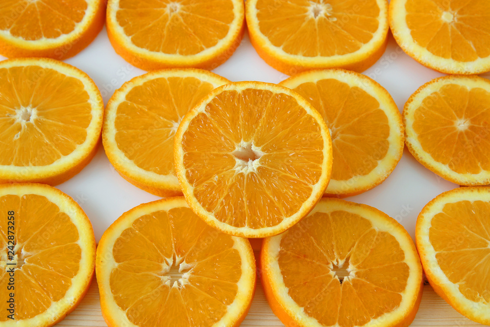 slices of orange on white background slices of orange on white background