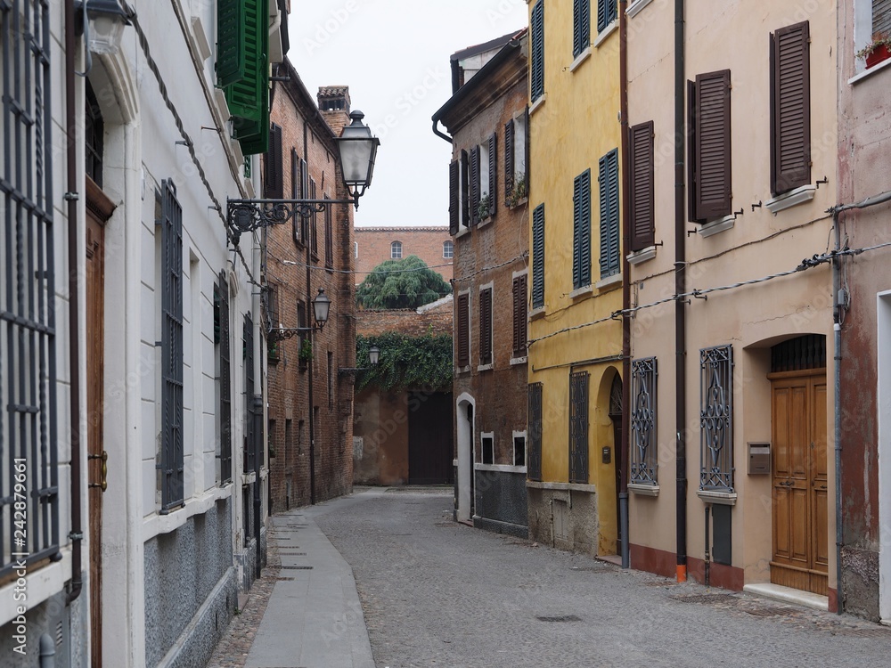 Fototapeta premium Ferrara, Italy. Old street in the historic centre.