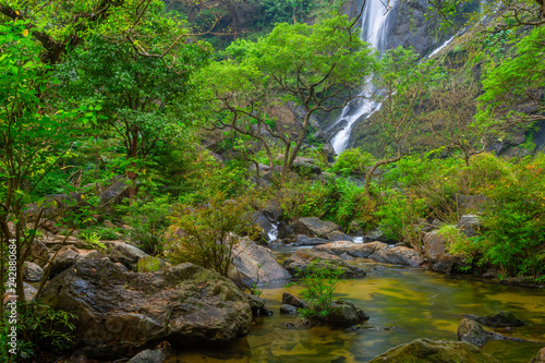 Khlong Lan Waterfall, the beautiful waterfall in deep forest at Khlong Lan National Park ,Kamphaeng Phet, Thailand © rbk365