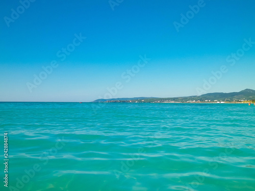 Blue water of Tyrrhenian sea in Vada, Tuscany, Italy.