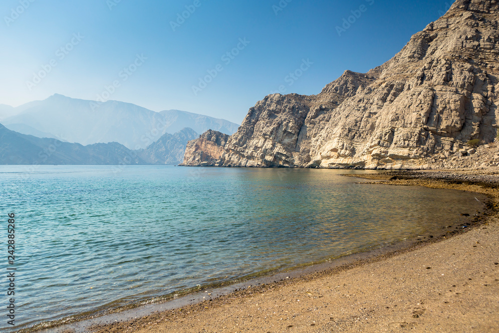 Charming view of the mountains and the sea in the haze near the Musandam