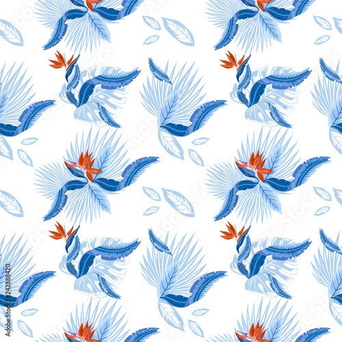 Vector  seamless pattern of tropical  palm leaves  monstera  leaves  and coral flowers of the bird of paradise  Strelitzia  plumeria. Wallpaper trend design.