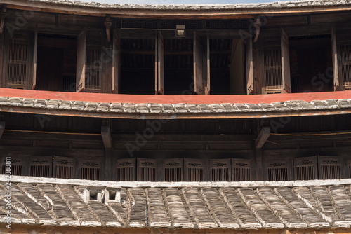 Traditional chinese carvings on roof at Tulou at Unesco heritage site near Xiamen
