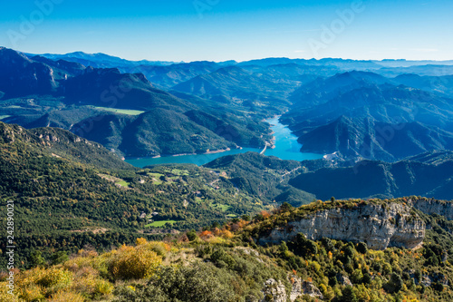 Mountains landscape with the blue waters of Baells Reservoir in the valley  Catalonia  Spain.