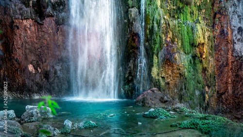 Colorful Waterfall within the National Park of Plitvive Lakes in Croatia