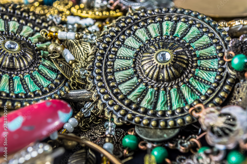 Detailed view of various Jewelry and props