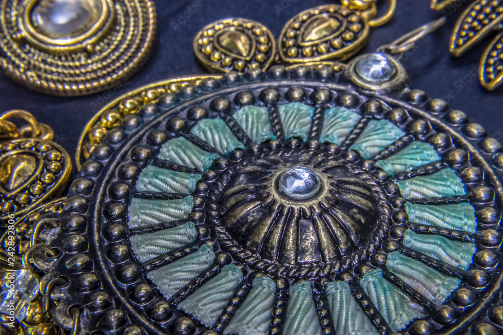 Detailed view of various Jewelry and props