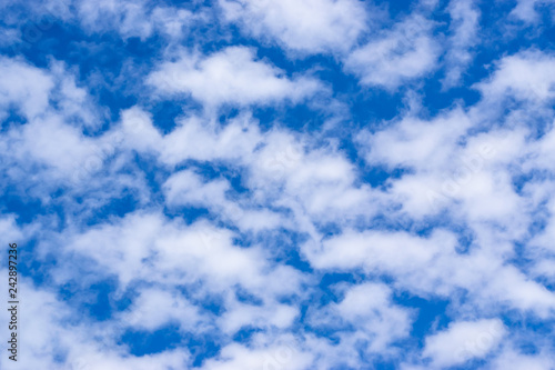 White clouds on a blue sky, texture background.