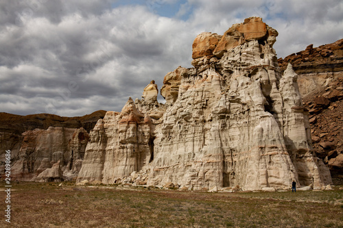 Spires of siltstone stand below the clouds