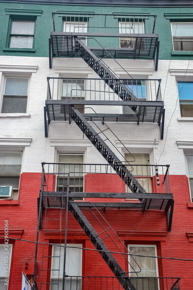 Building painted with the colours of the italian flag, Little Italy, New York City, United States