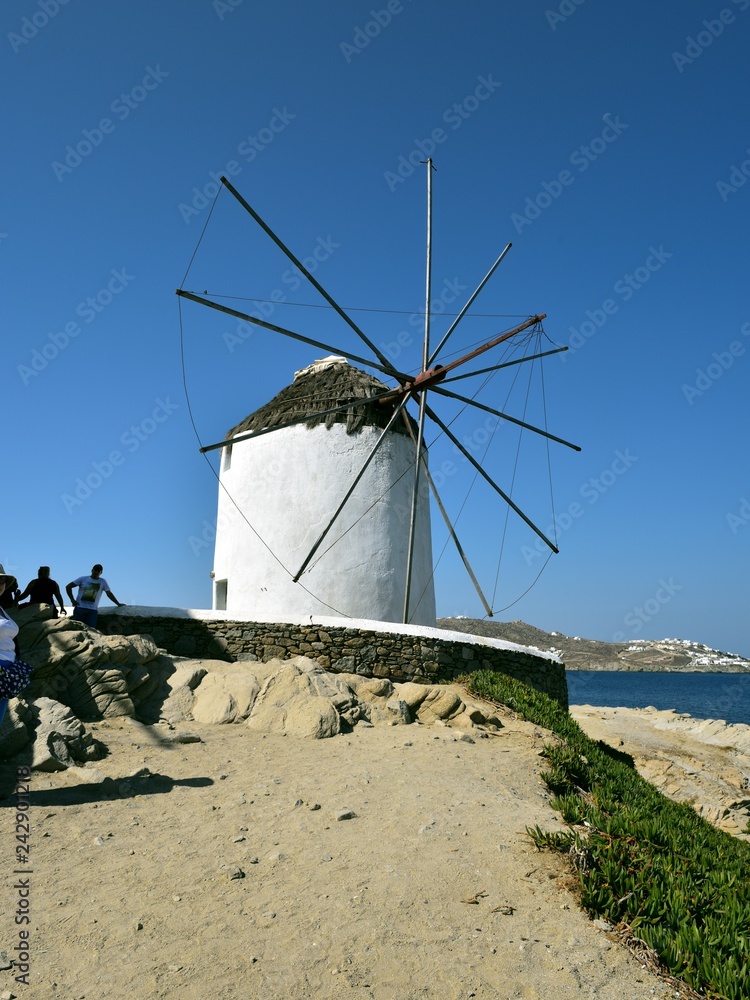 Posing by the white windmills of Mykonos