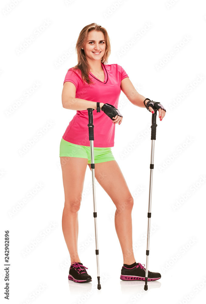 Nordic walking athletic woman posing on white background Nordic walking athletic woman posing on white background