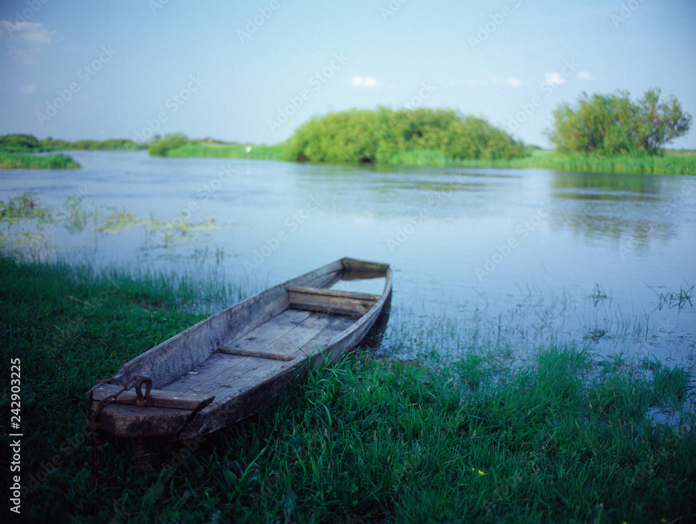 Boat in the Biebrzanski National Park, Biebrza Park Narodowy, Biebrzanski National Park, Biebrza rive.r Boat in the Biebrzanski National Park, Biebrza Park Narodowy, Biebrzanski National Park, Biebrza rive.r