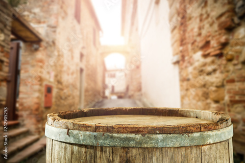 wooden barrel as a table with a free space for an advertising product, the hero on the background of the landscape   © magdal3na