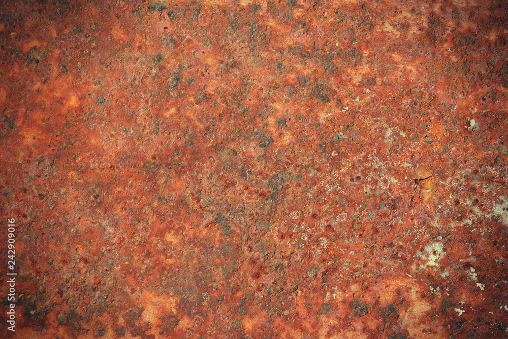 Rusty metal corroded texture background with cracks, vignette and toning Rusty metal corroded texture background with cracks, vignette and toning