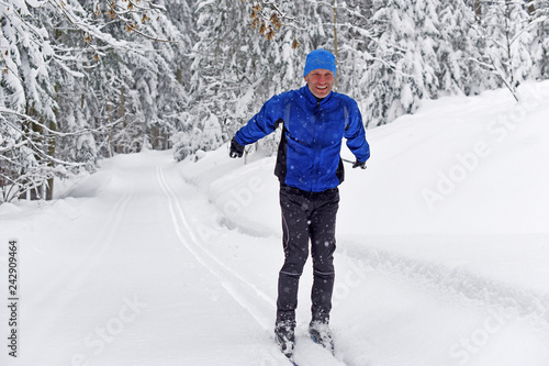 Cross-country skiing. Young man doing outdoor exercise. Winter sport and healthy lifestyle.