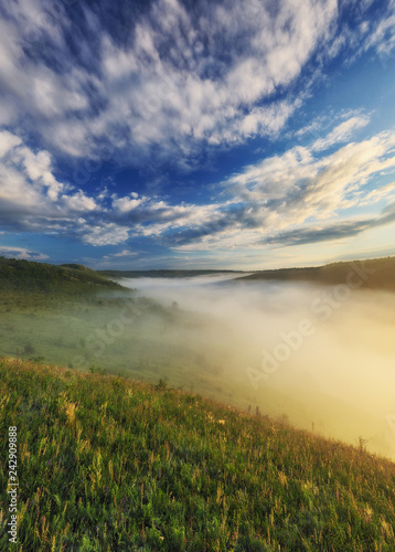 foggy canyon of a picturesque river. spring dawn. morning in national park   © sergnester
