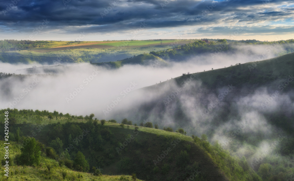 foggy canyon of a picturesque river. spring dawn. morning in national park
