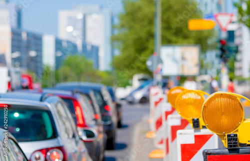 a road construction site and many cars