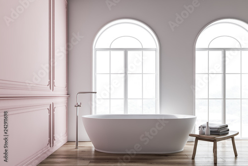 Pink and white bathroom interior  tub