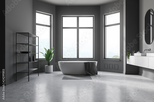 Gray bathroom  tub  sink and shelves