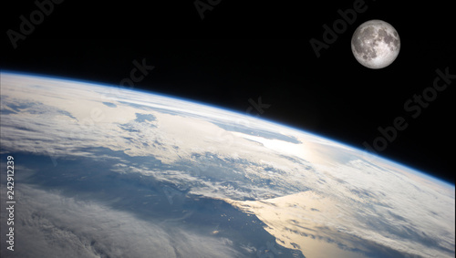 Planet Earth and the Moon from space. Image elements furnished by NASA.