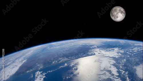 Fototapeta Naklejka Na Ścianę i Meble -  Planet Earth and the Moon from space. Image elements furnished by NASA.